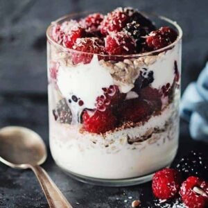 Coconut Yogurt Parfait with berries and coconut flakes